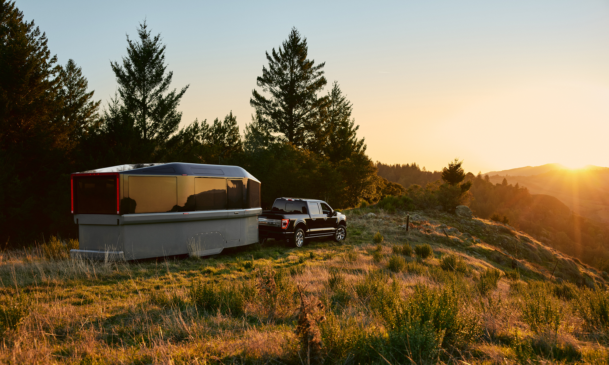 Lightship eRV - RV that is towable with an electric vehicle - in camping mode with a beautiful sunrise
